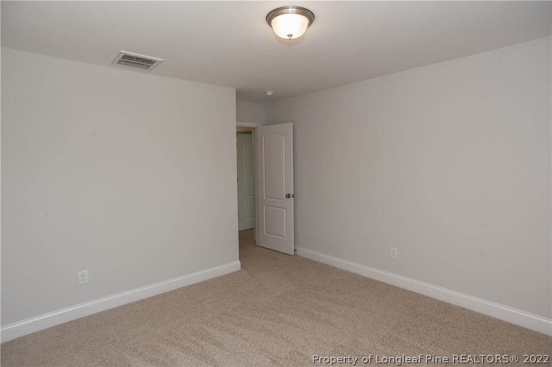 454 Pittfield Run Cameron, NC 28326 - Photo 25 of 37 a view of an empty room