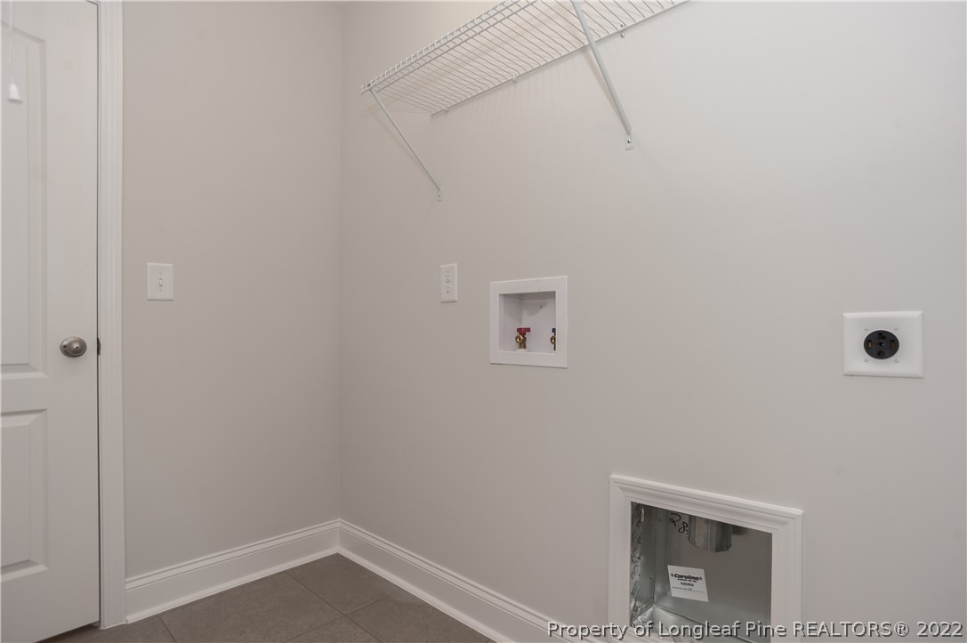 454 Pittfield Run Cameron, NC 28326 - Photo 29 of 37 a view of small space with empty racks on the wall