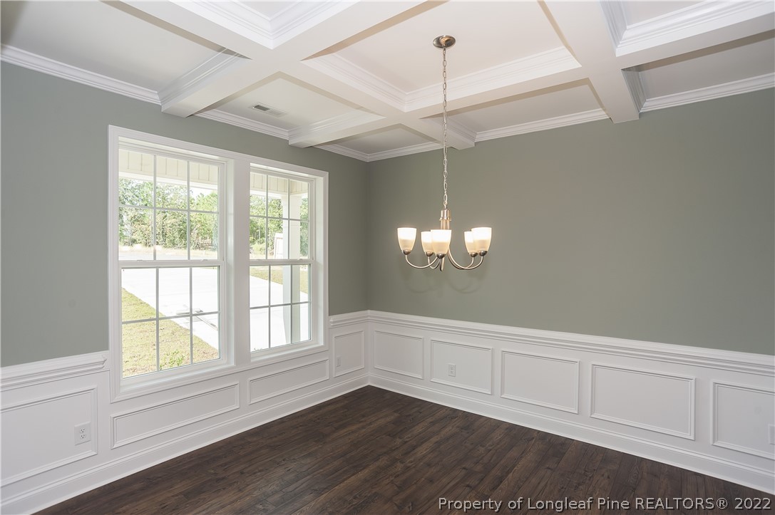 454 Pittfield Run Cameron, NC 28326 - Photo 3 of 37 a view of an empty room with wooden floor and a window