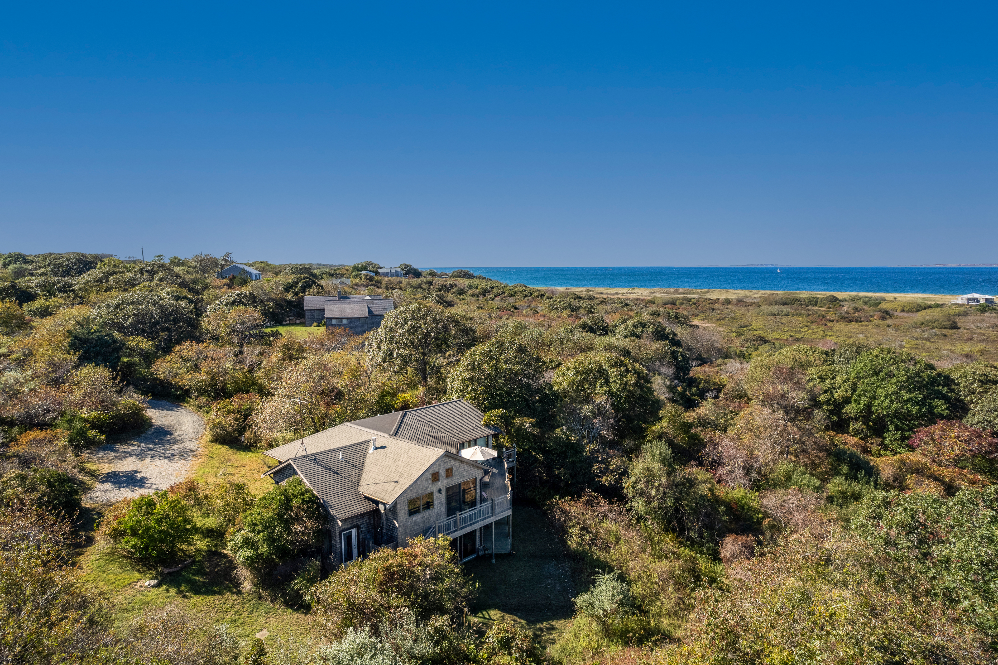 an aerial view of residential house with outdoor space