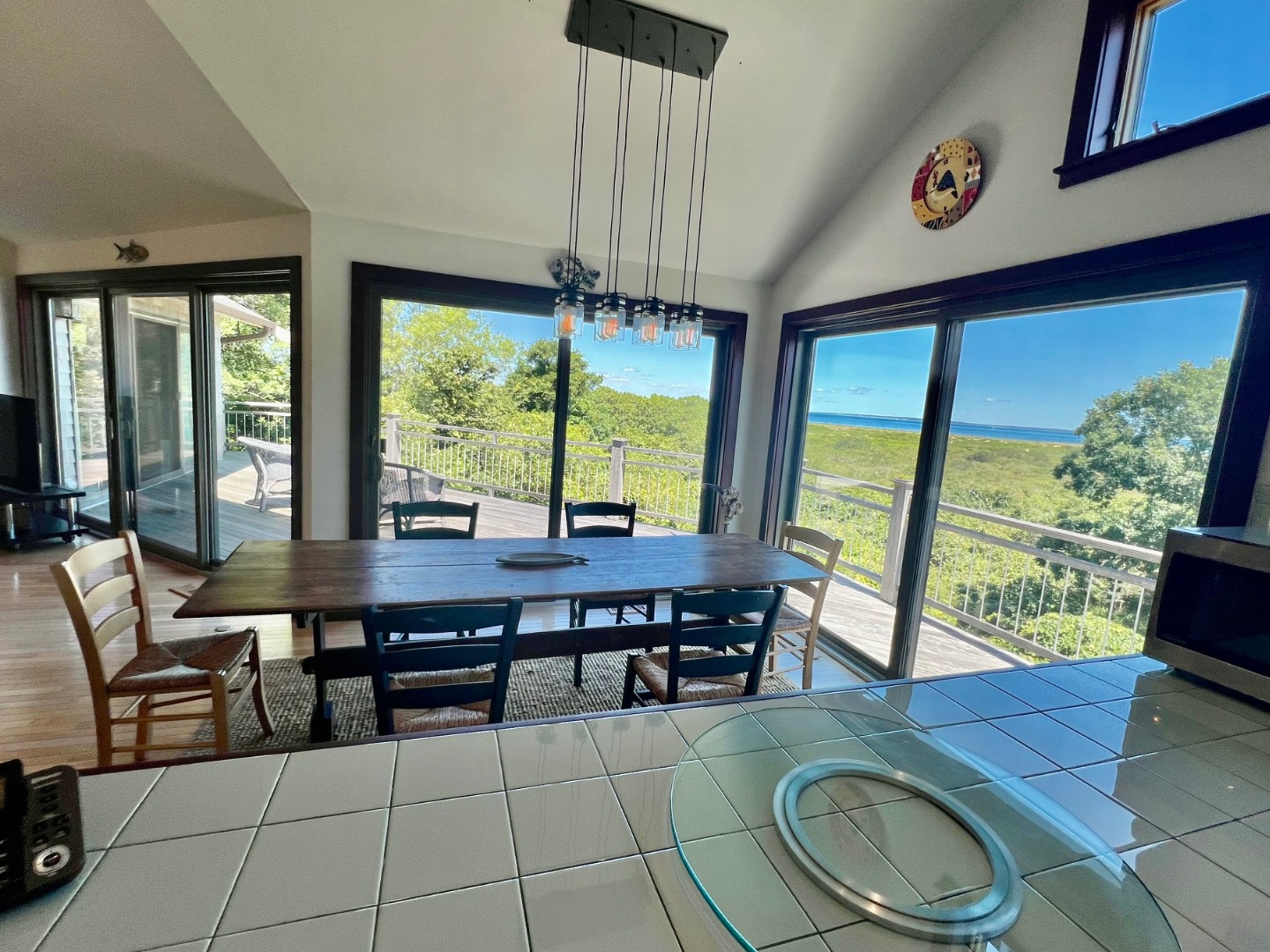 382 Lighthouse Road Aquinnah, MA 02535 - Photo 15 of 29 a room with furniture and large windows