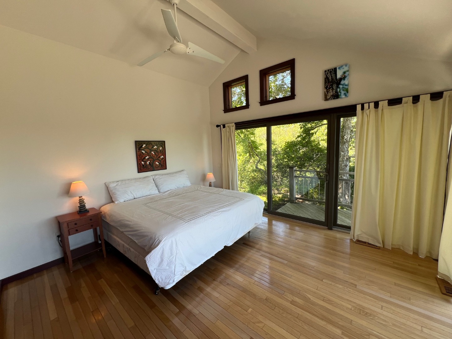 382 Lighthouse Road Aquinnah, MA 02535 - Photo 19 of 29 a bedroom with a bed and a large window