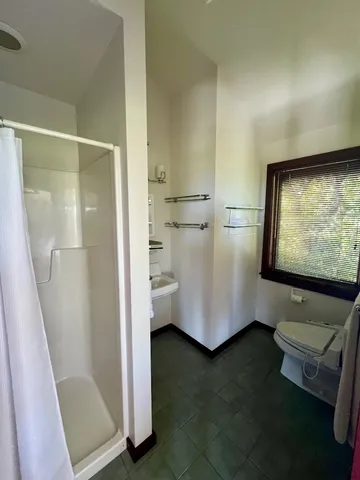 a view of room with flat screen tv