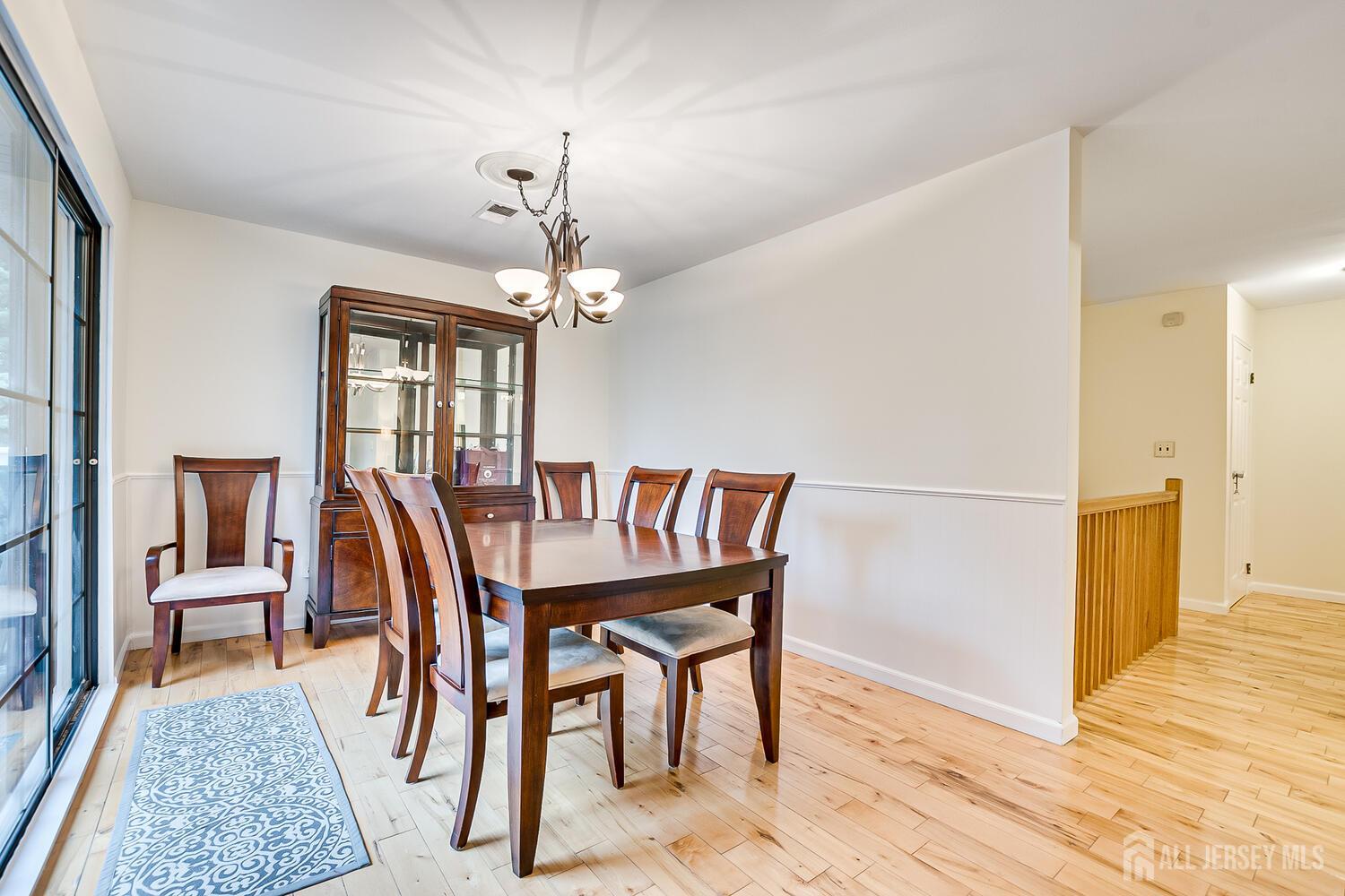 30-5 Prospect Street, Unit 2 Metuchen, NJ 08840 - Photo 7 of 23 a view of a dining room with furniture
