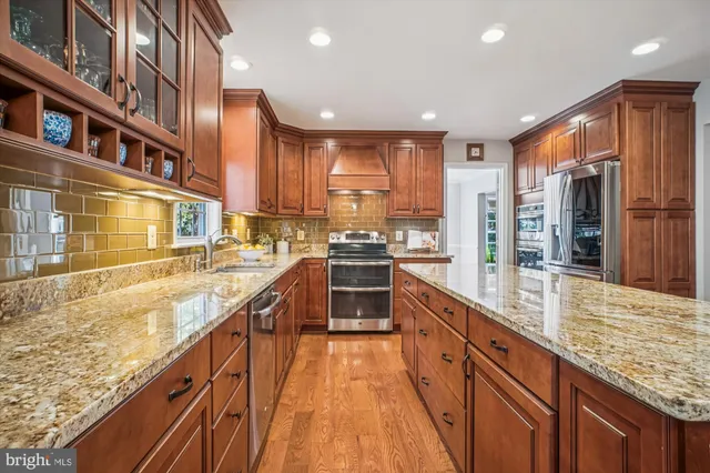 a bedroom with a bed and a night stand