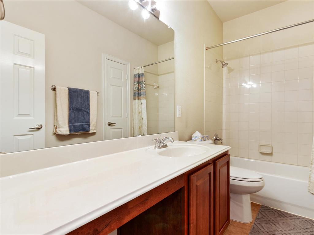 5440 Lavaca Road Grand Prairie, TX 75052 - Photo 8 of 22 Full vanity mirror with overhead lighting
