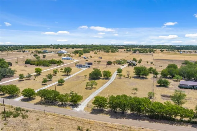 a view of a city with an ocean view