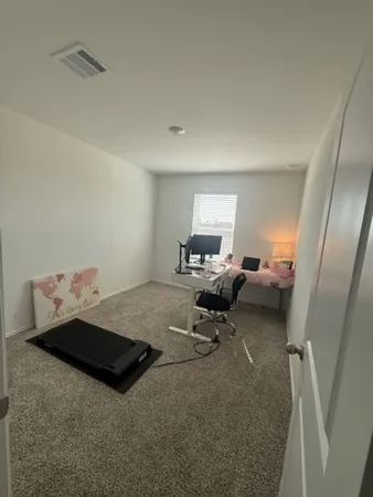 a kids room with toys and a couch