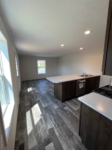 a view of workspace with wooden floor