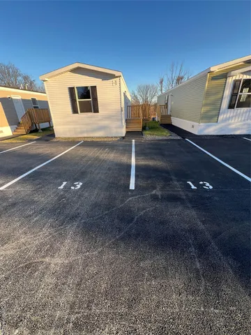 a house view with a backyard space