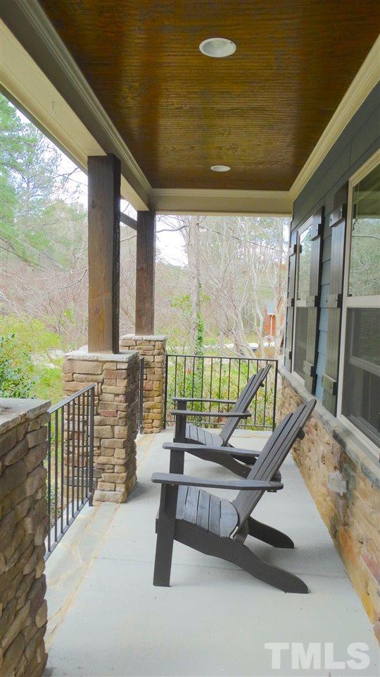 1308 Trinity Circle Raleigh, NC 27607 - Photo 21 of 25 Covered Rocking Chair Front Porch, perfect for relaxing on those summer evenings.