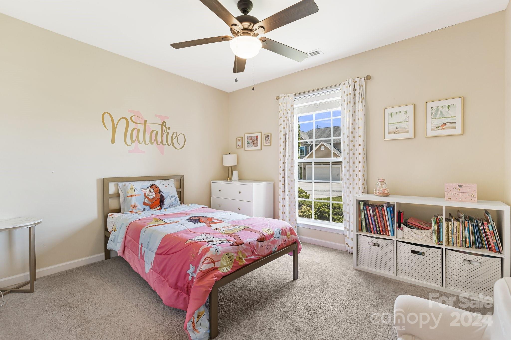335 West Swift Creek Road Fletcher, NC 28732 - Photo 23 of 37 a bedroom with a bed and a book shelf