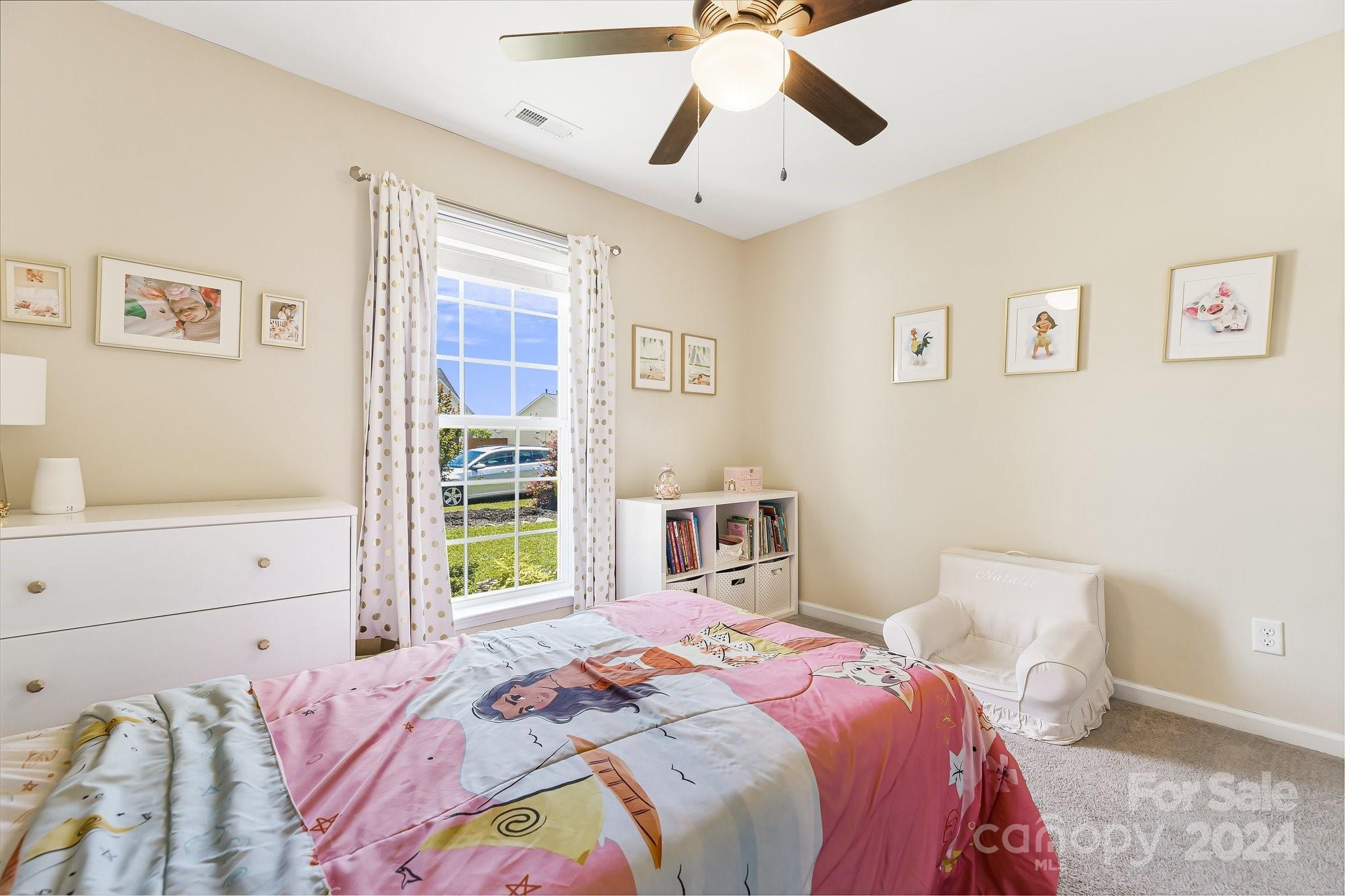 335 West Swift Creek Road Fletcher, NC 28732 - Photo 25 of 37 a bedroom with a bed and a window