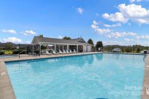 335 West Swift Creek Road Fletcher, NC 28732 - Photo 36 of 37 a view of a house with pool and a yard