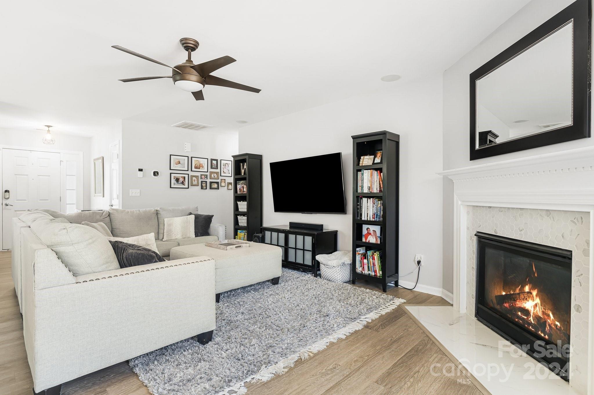 335 West Swift Creek Road Fletcher, NC 28732 - Photo 8 of 37 a living room with furniture and a flat screen tv