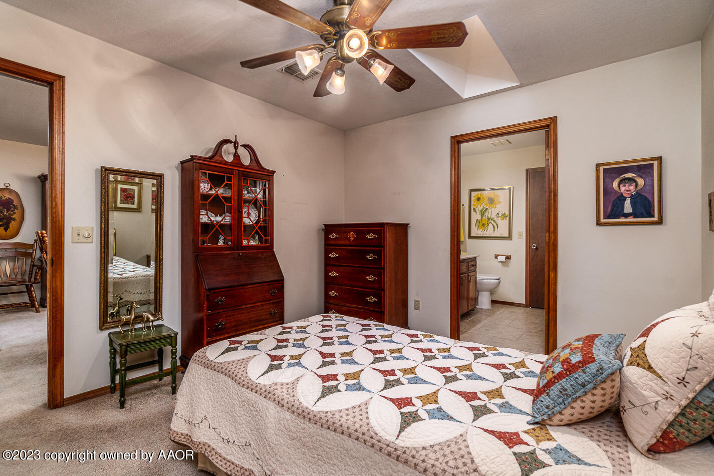 3406 Gladstone Lane Amarillo, TX 79121 - Photo 16 of 21 a bedroom with a bed and a dresser