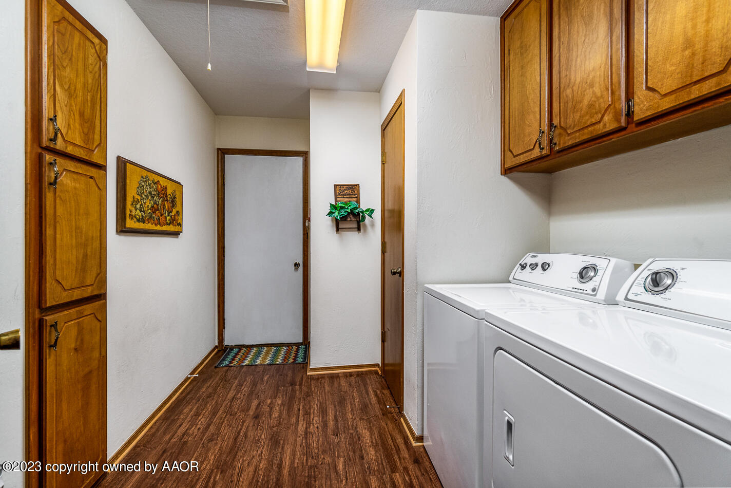3406 Gladstone Lane Amarillo, TX 79121 - Photo 18 of 21 a view of utility room with washer and dryer