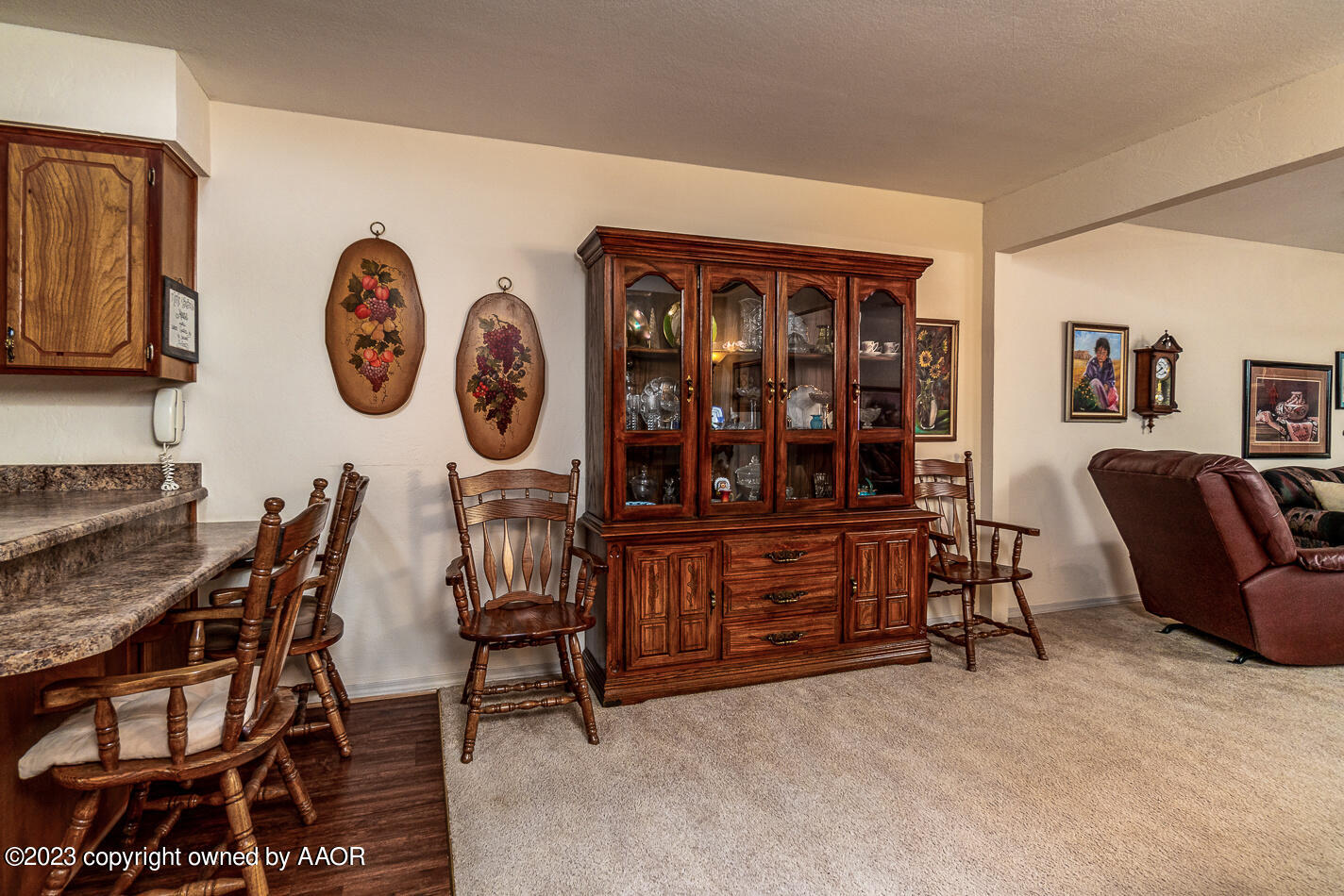 3406 Gladstone Lane Amarillo, TX 79121 - Photo 6 of 21 a view of a dining room with furniture and chandelier