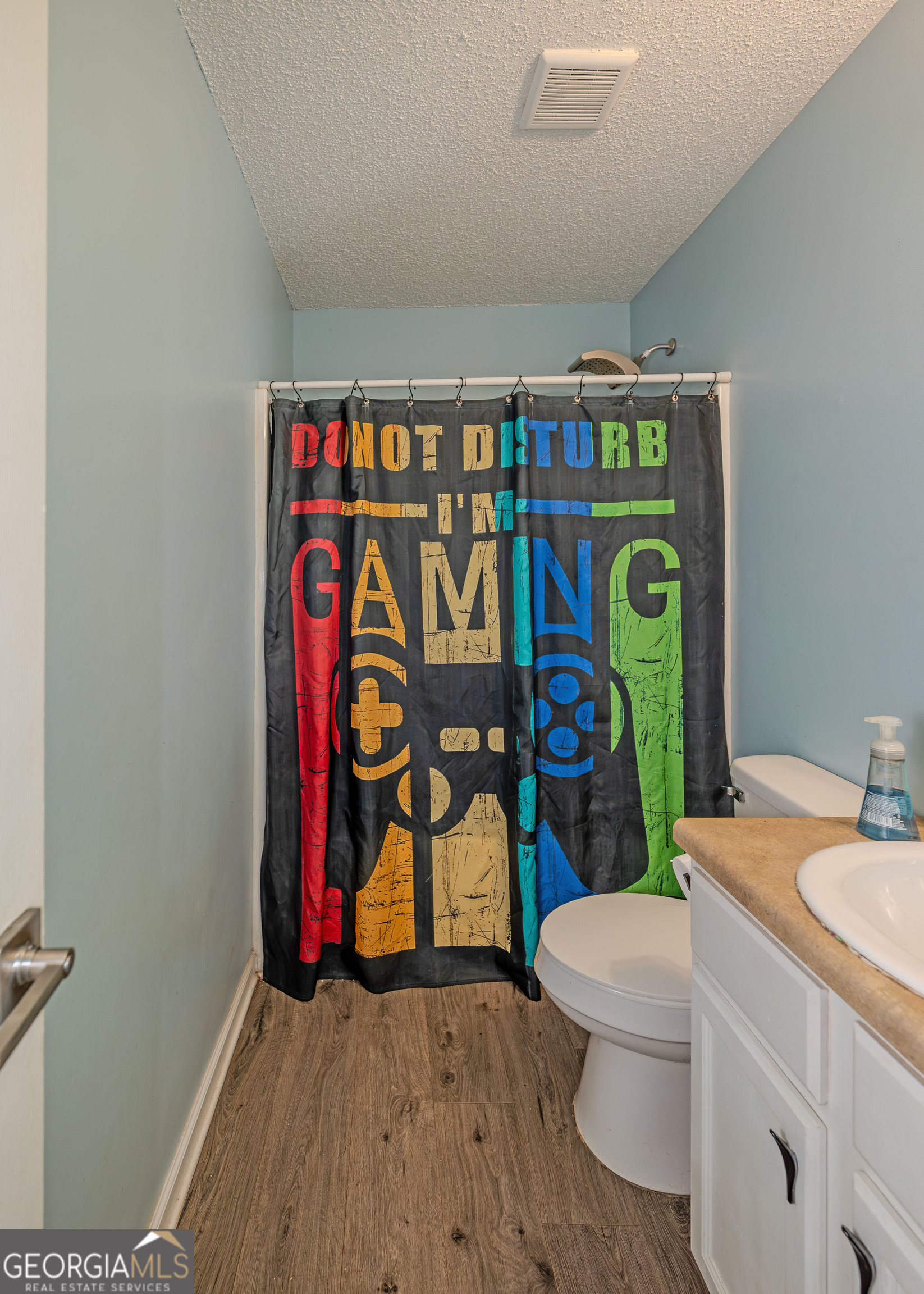 87 Little Milltown Road Hartwell, GA 30643 - Photo 15 of 39 a bathroom with a toilet sink and mirror