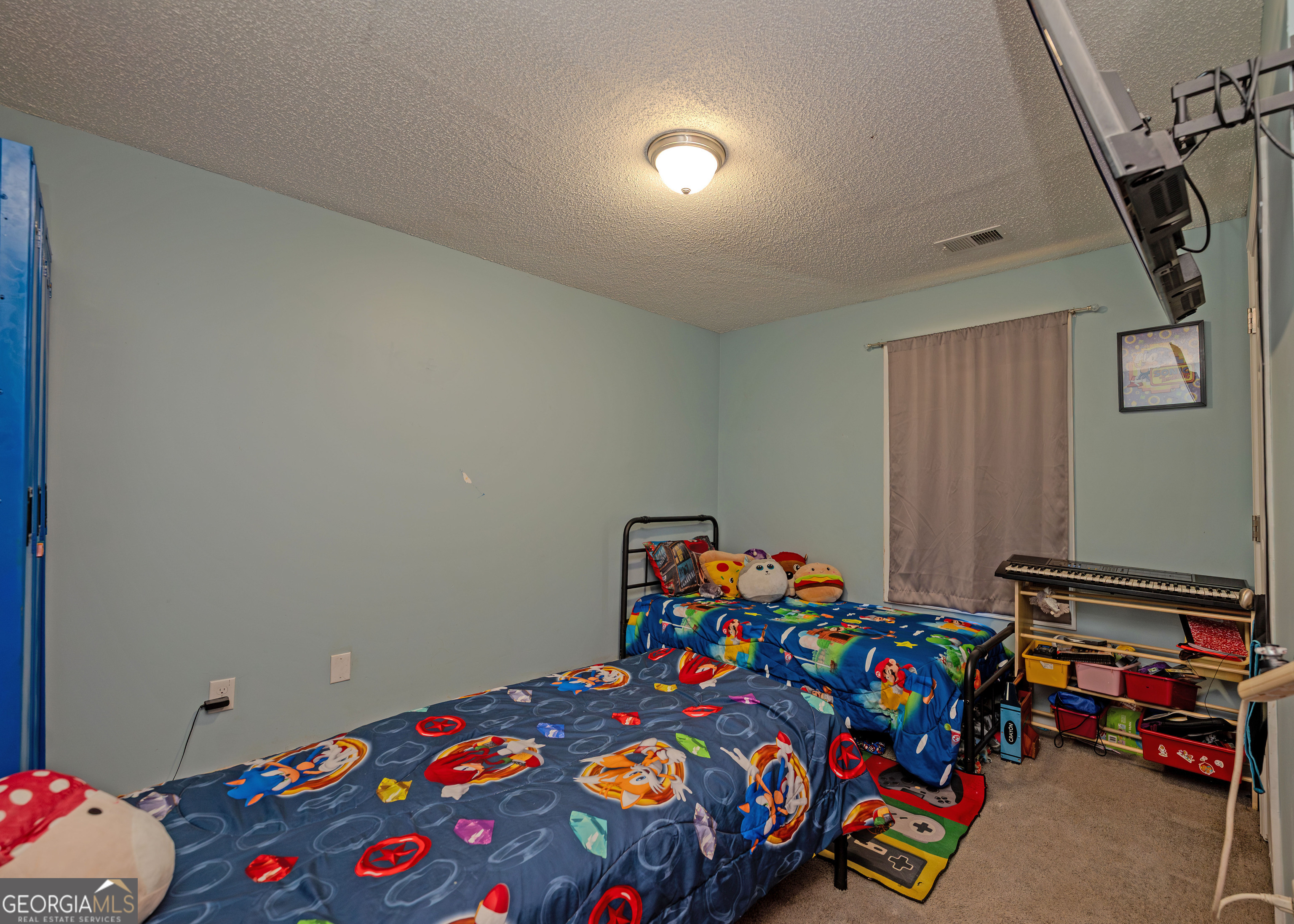 87 Little Milltown Road Hartwell, GA 30643 - Photo 19 of 39 a bedroom with bed and wooden floor