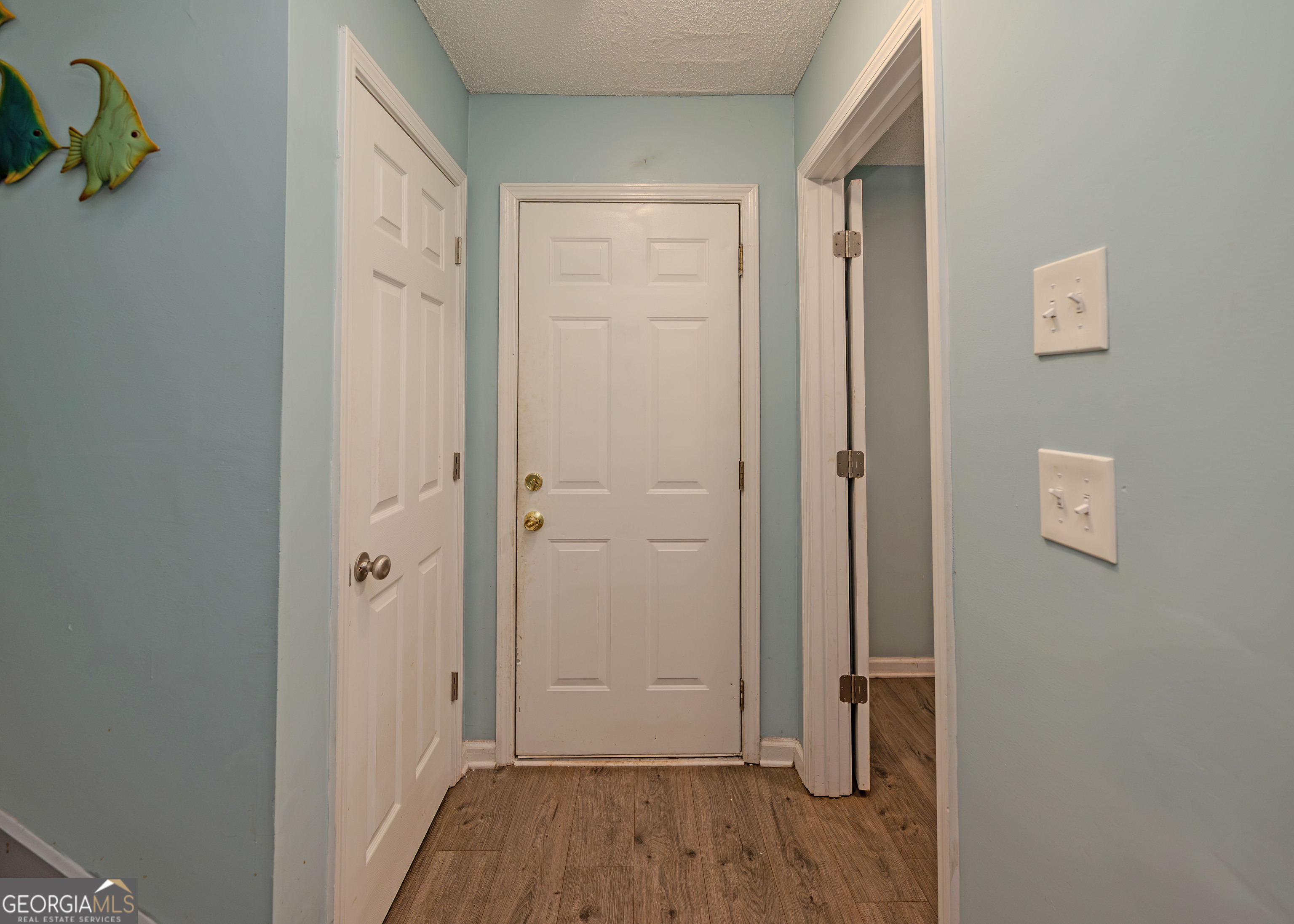 87 Little Milltown Road Hartwell, GA 30643 - Photo 27 of 39 a view of a hallway with wooden floor