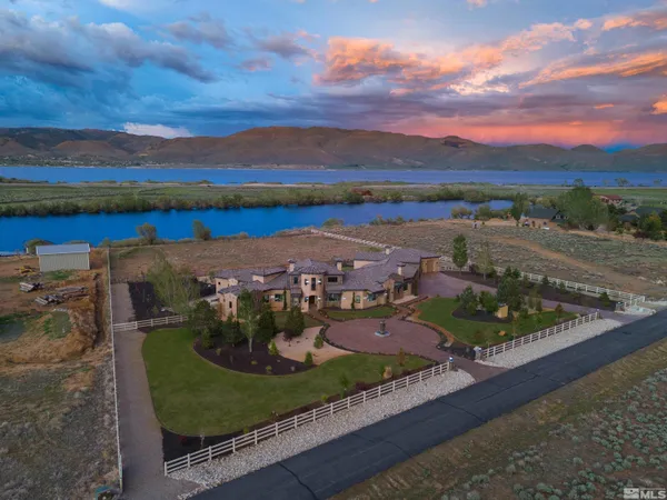 an aerial view of a house with a garden