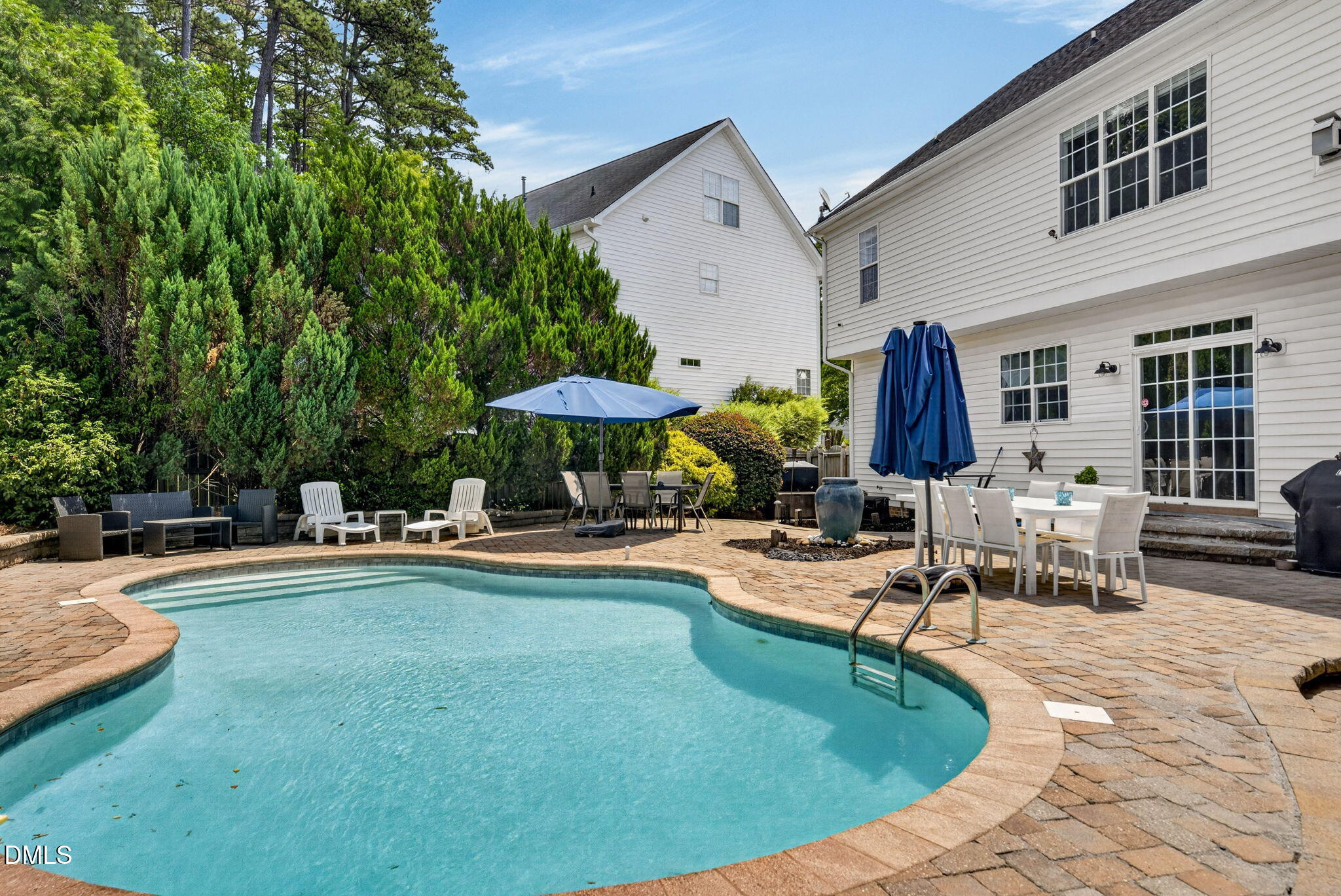 1258 Horsham Way Apex, NC 27502 - Photo 29 of 32 a view of a house with swimming pool and sitting area