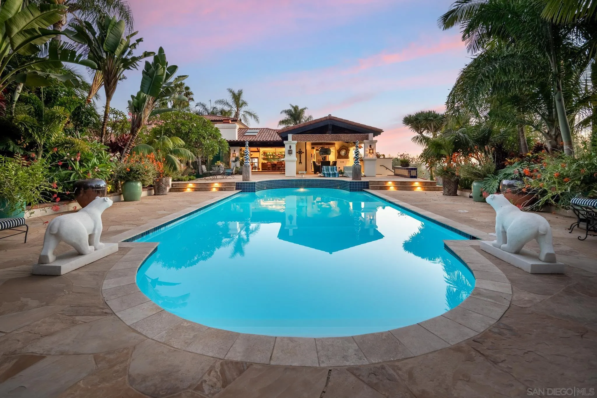 18245 Paseo Victoria Rancho Santa Fe, CA 92067 - Photo 38 of 40 a view of a swimming pool with a lounge chairs