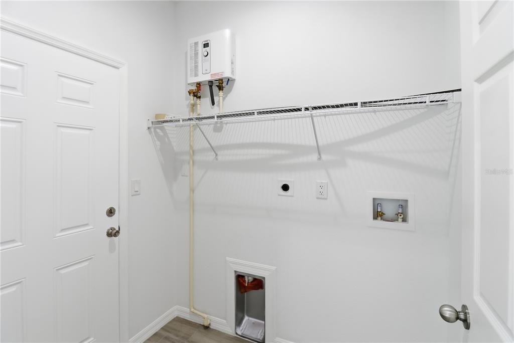 822 Poplar Street Inverness, FL 34452 - Photo 29 of 45 a bathroom with a shower