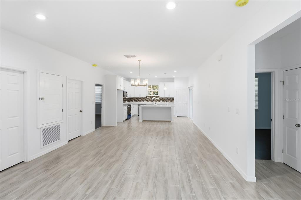 822 Poplar Street Inverness, FL 34452 - Photo 3 of 45 a view of kitchen with wooden floor