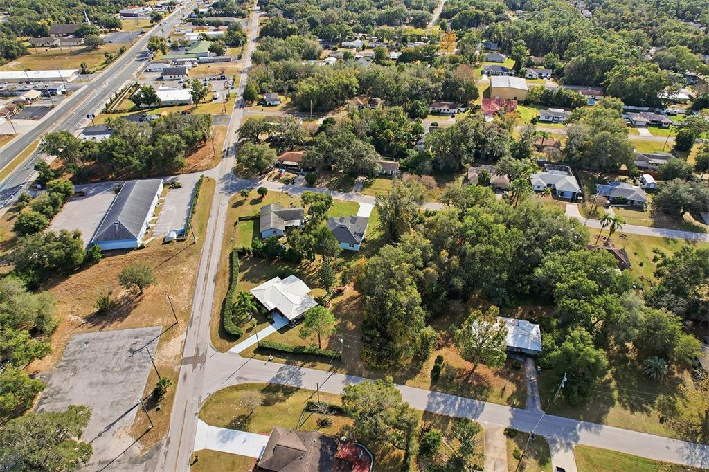 822 Poplar Street Inverness, FL 34452 - Photo 41 of 45 an aerial view of residential houses with outdoor space