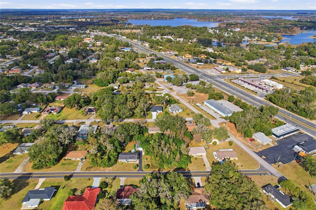 822 Poplar Street Inverness, FL 34452 - Photo 43 of 45 an aerial view of residential houses with outdoor space