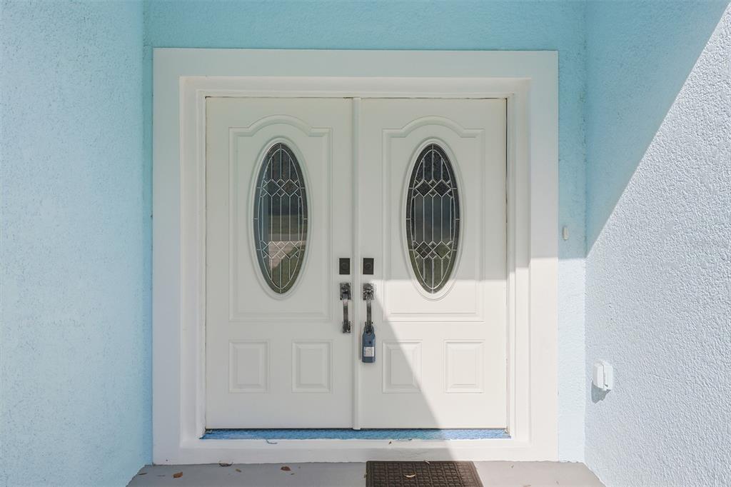 822 Poplar Street Inverness, FL 34452 - Photo 5 of 45 a utility room with dryer and washer