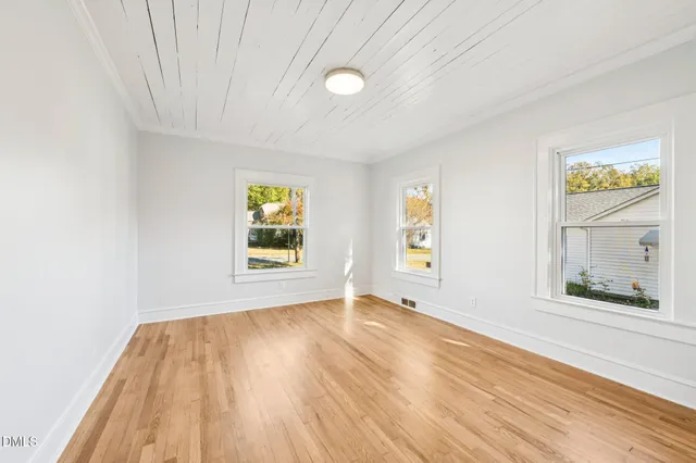 a view of an empty room and window