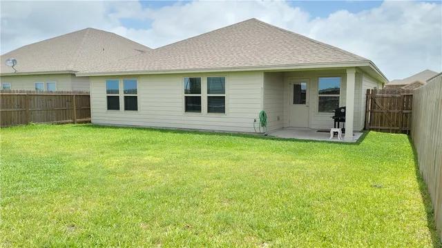 a house view with a garden space