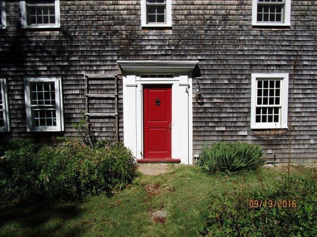 46 Main Street Brewster, MA 02631 - Photo 6 of 19 a front view of a house with a yard