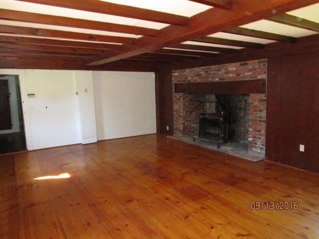 46 Main Street Brewster, MA 02631 - Photo 7 of 19 a view of a room with wooden floor