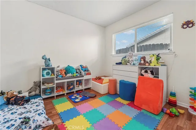 a room with furniture and a rug