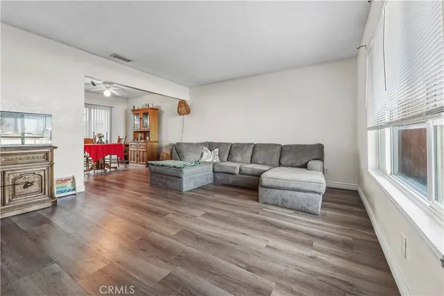 a living room with furniture or kitchen and a fireplace