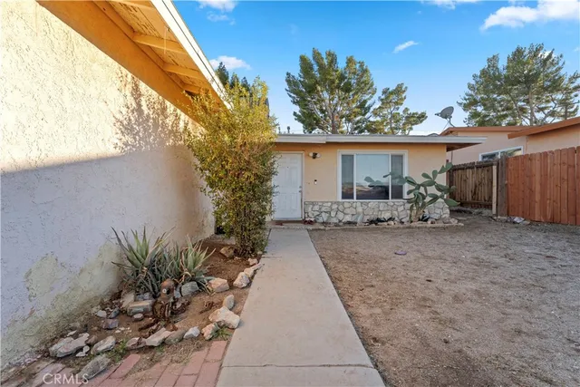a view of a house with a patio