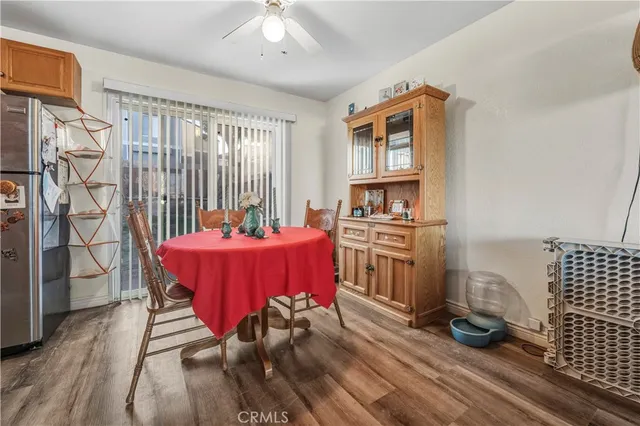 a bed room with furniture and wooden floor