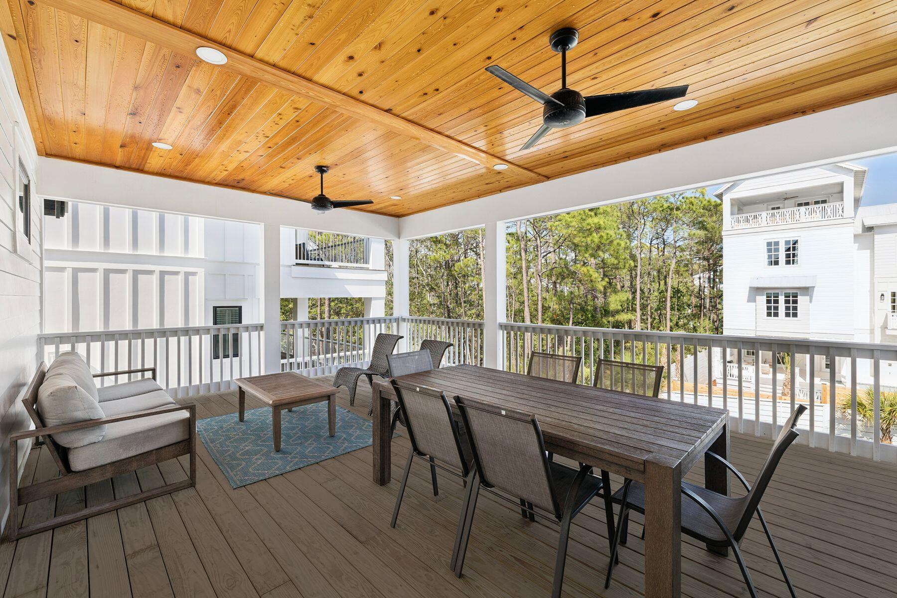58 Santa Clara Street Santa Rosa Beach, FL 32459 - Photo 22 of 49 a view of a patio with wooden floor