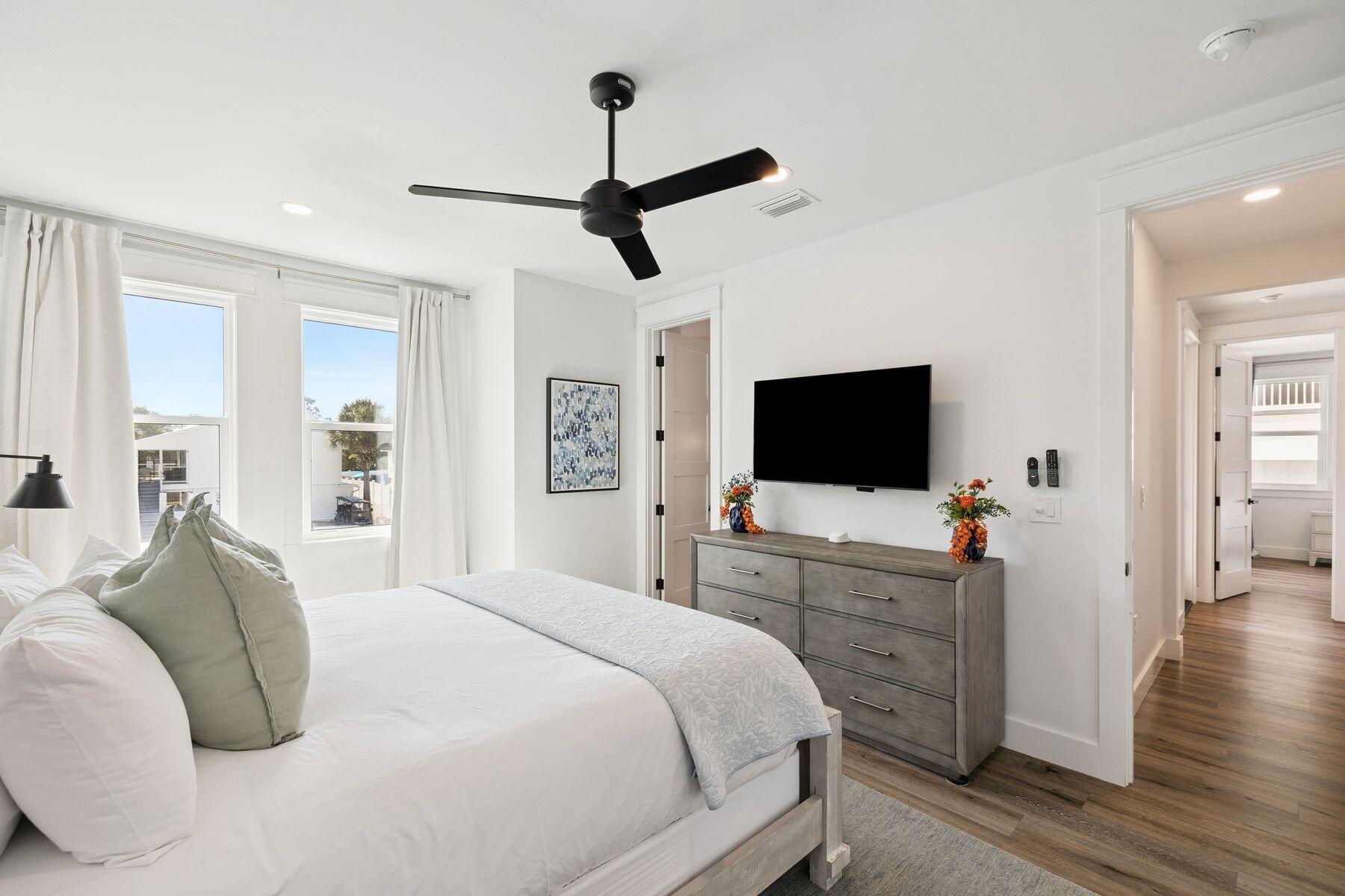 58 Santa Clara Street Santa Rosa Beach, FL 32459 - Photo 24 of 49 a bedroom with a bed and a flat screen tv