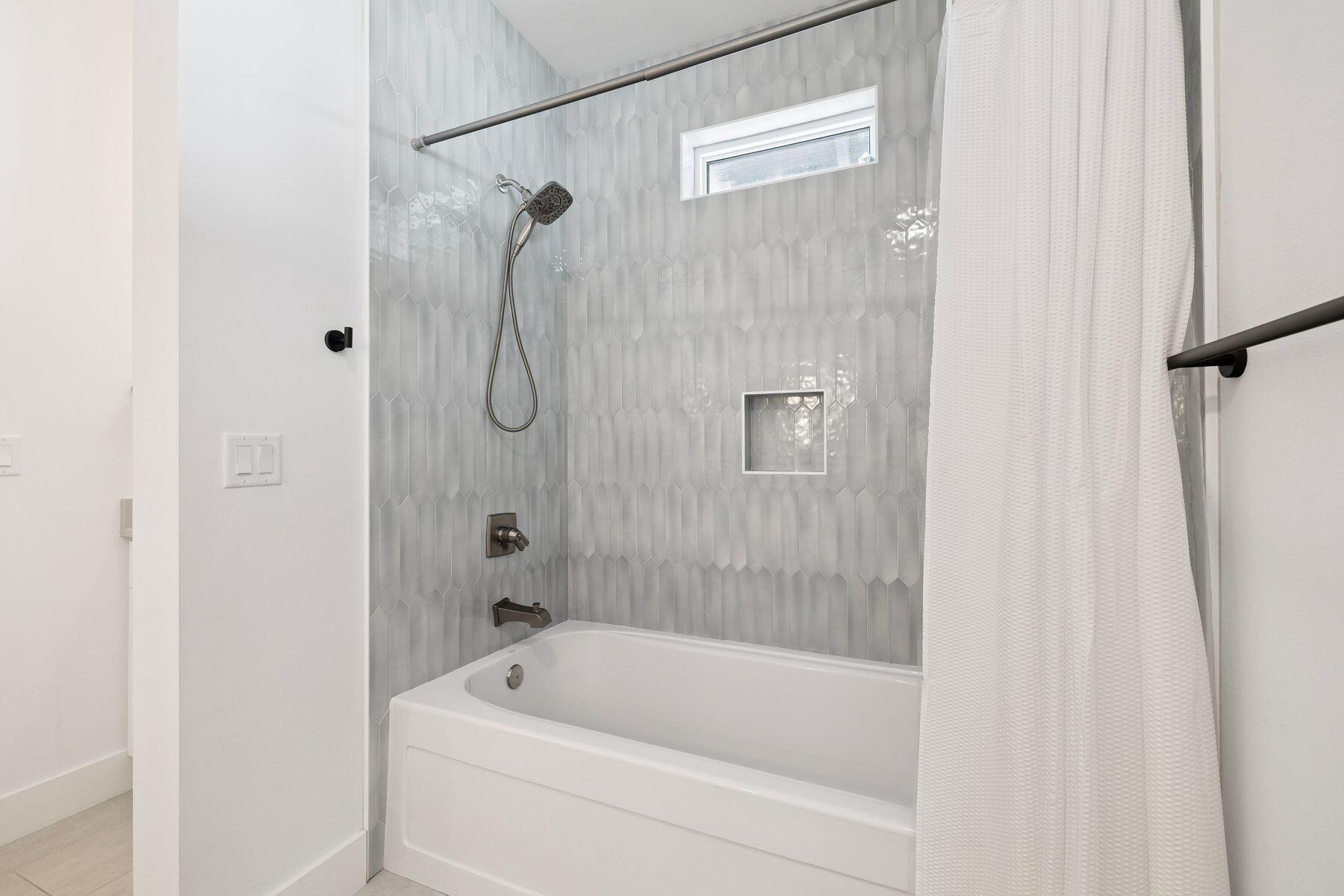 58 Santa Clara Street Santa Rosa Beach, FL 32459 - Photo 32 of 49 a bathroom with a tub and a shower