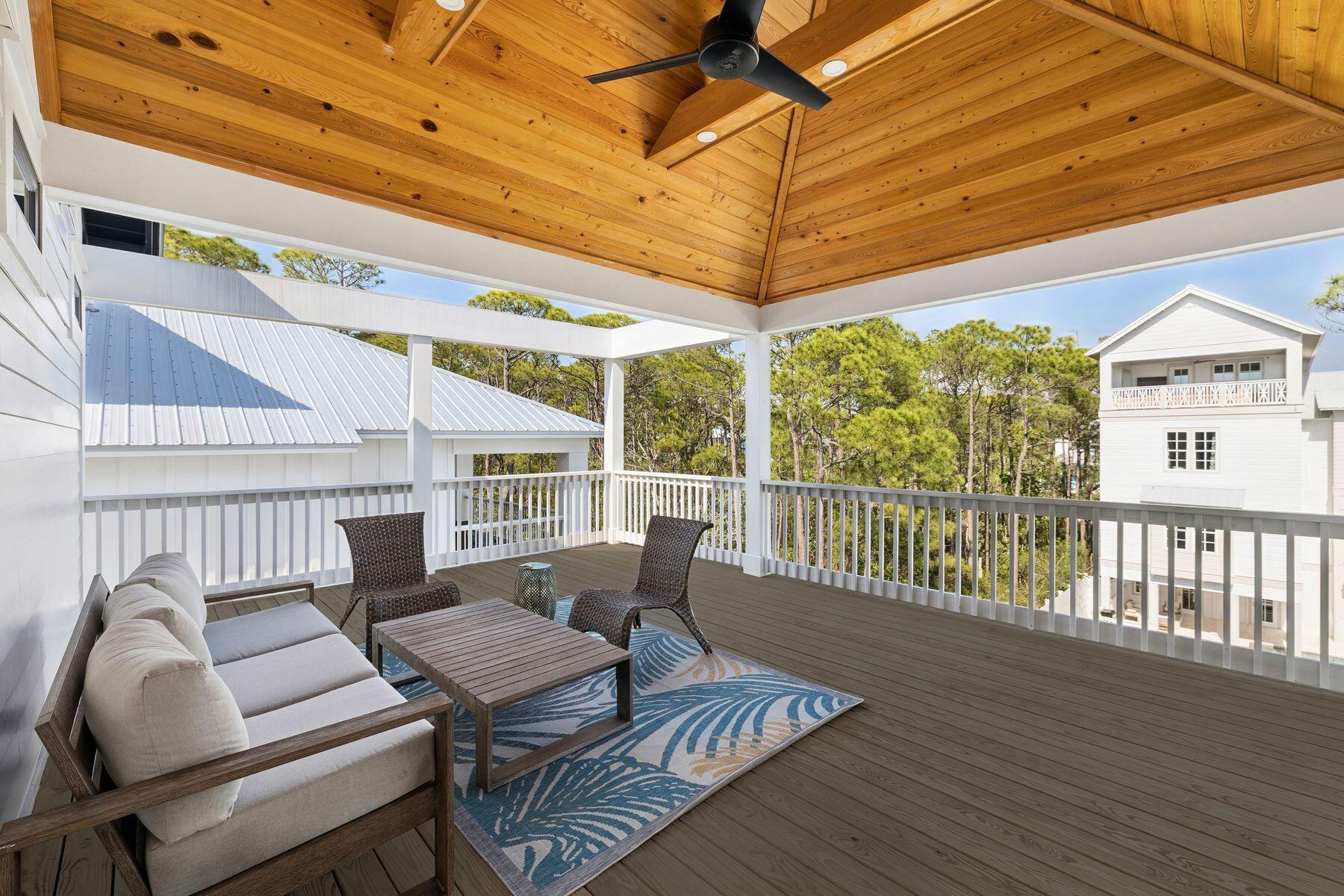 58 Santa Clara Street Santa Rosa Beach, FL 32459 - Photo 34 of 49 a balcony with furniture