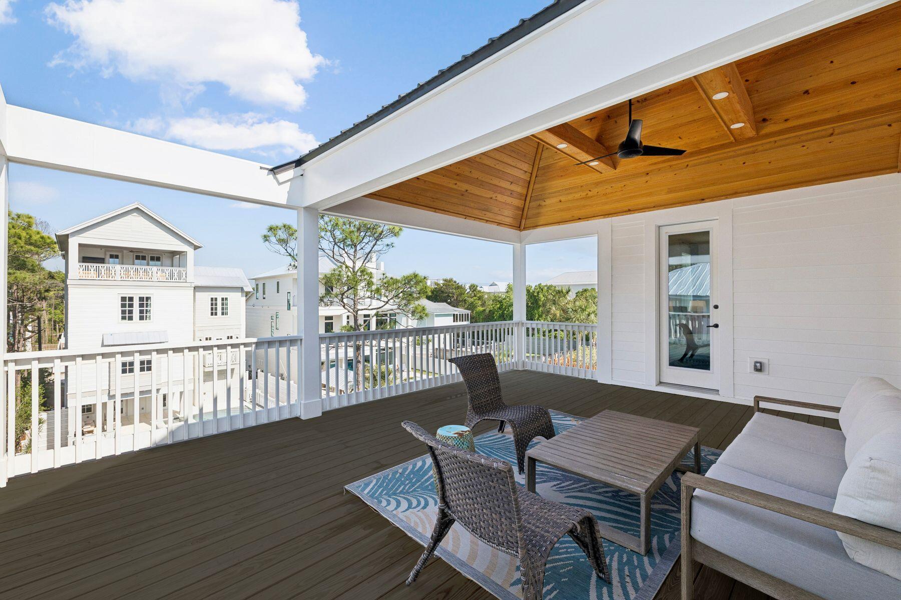 58 Santa Clara Street Santa Rosa Beach, FL 32459 - Photo 35 of 49 a view of a patio with a table and chairs