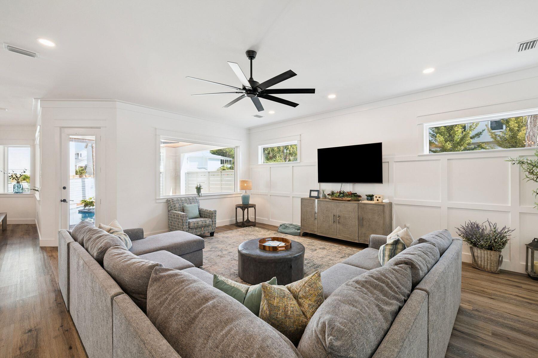 58 Santa Clara Street Santa Rosa Beach, FL 32459 - Photo 9 of 49 a living room with furniture and a flat screen tv