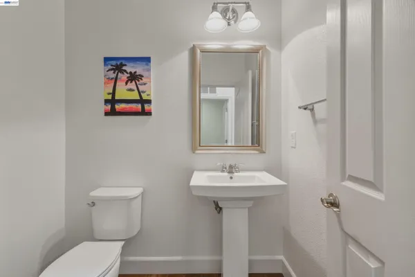 a spacious bedroom with a bed and a window