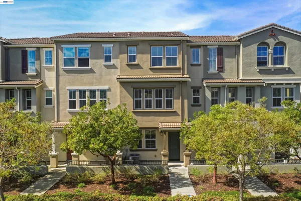 a view of a city with tall buildings in the background