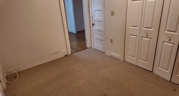 an empty room with a door